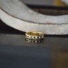 0.27 Ct. Channel Set Men's Wedding Ring Featuring Millgrain Design